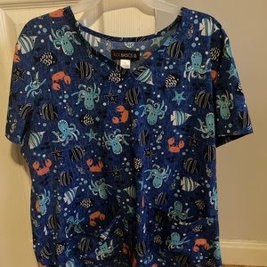 Ocean themed scrub top.